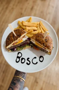 Best burger and fries at Bosco Café – one of the top places to eat in Waitomo for travellers and locals